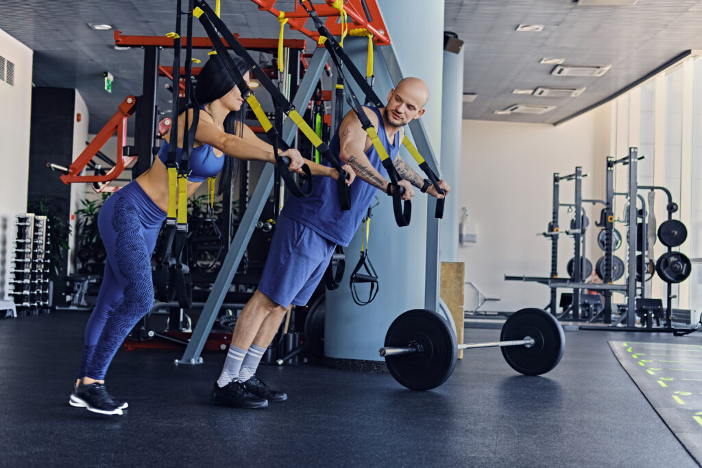 exercising-with-trx-straps-gym-club